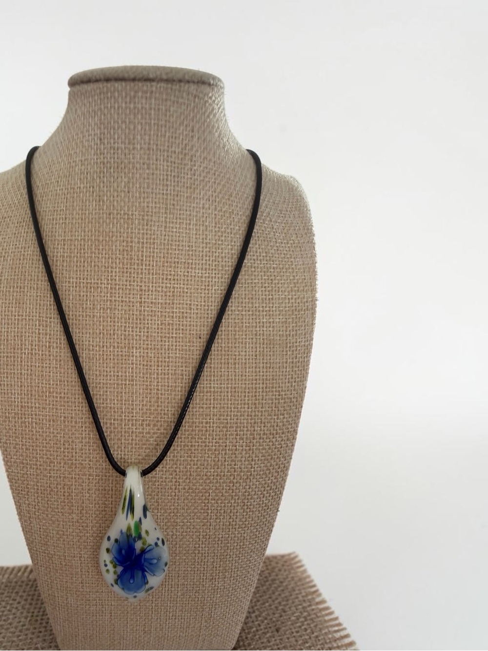 Handblown Glass Teardrop Pendant Necklace with Blue Floral Design